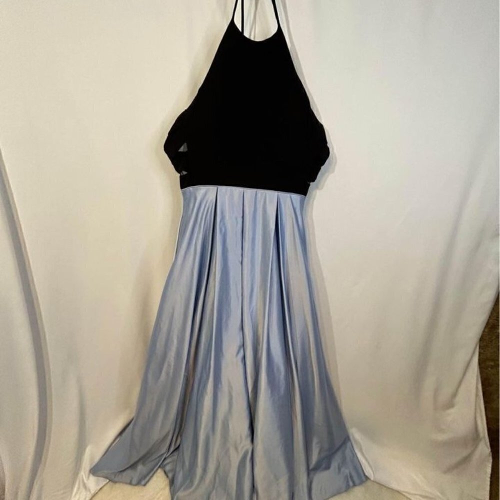 Long satin cut out halter ball gown. Size 9/10. Excellent condition. Built in br